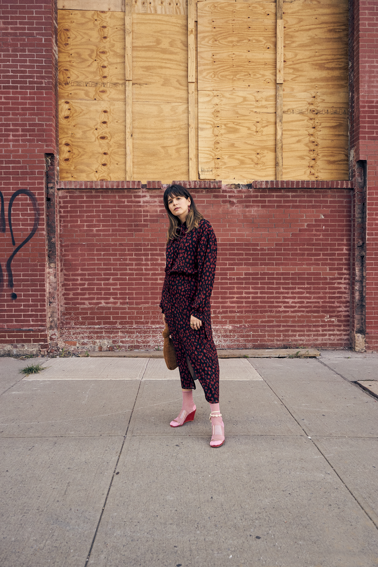 Maristella wears a Nanushka dress with Maryam Nassir Zadeh Olympia sandals and Hysteria socks