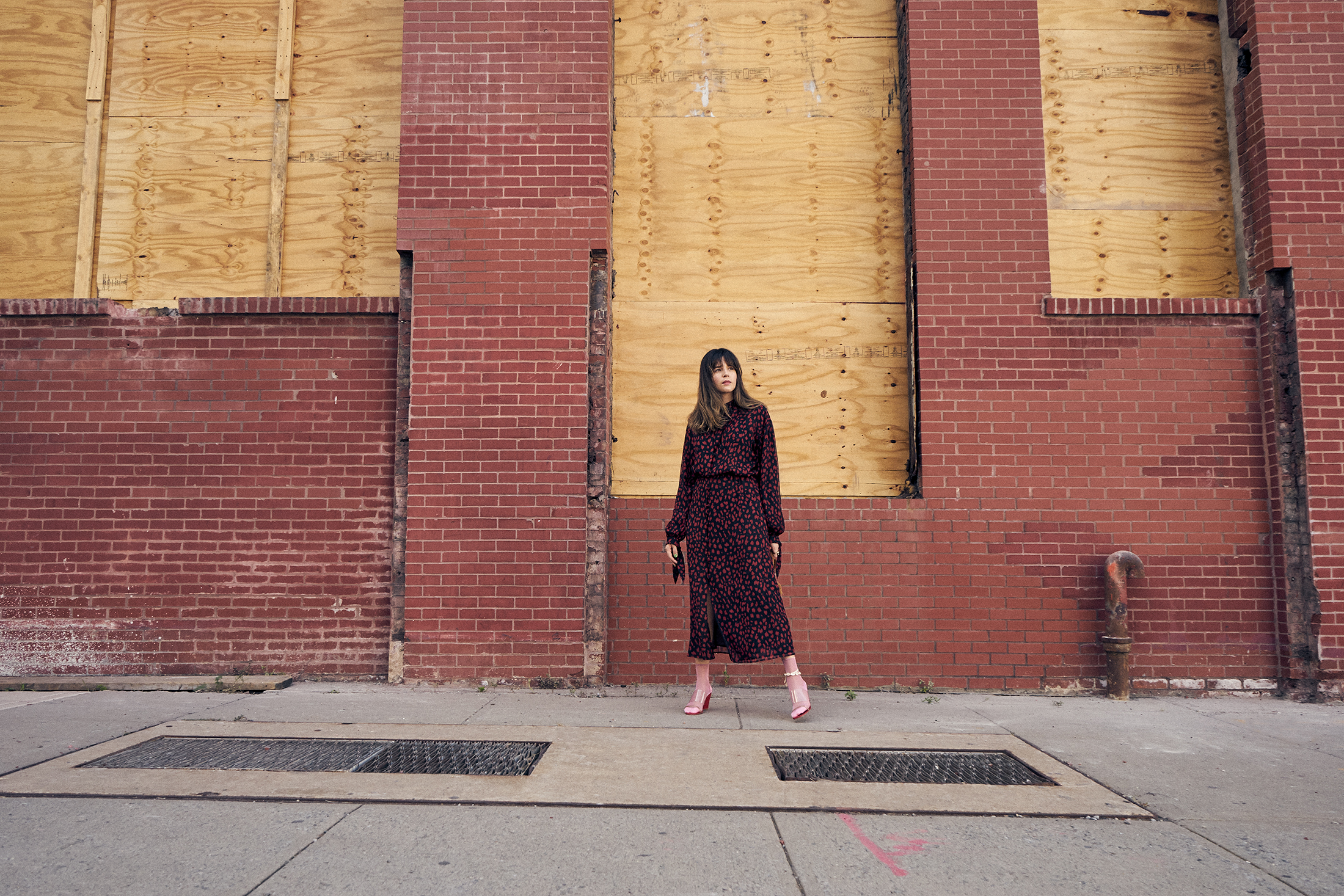 Maristella wears a Nanushka dress with Maryam Nassir Zadeh Olympia sandals and Hysteria socks