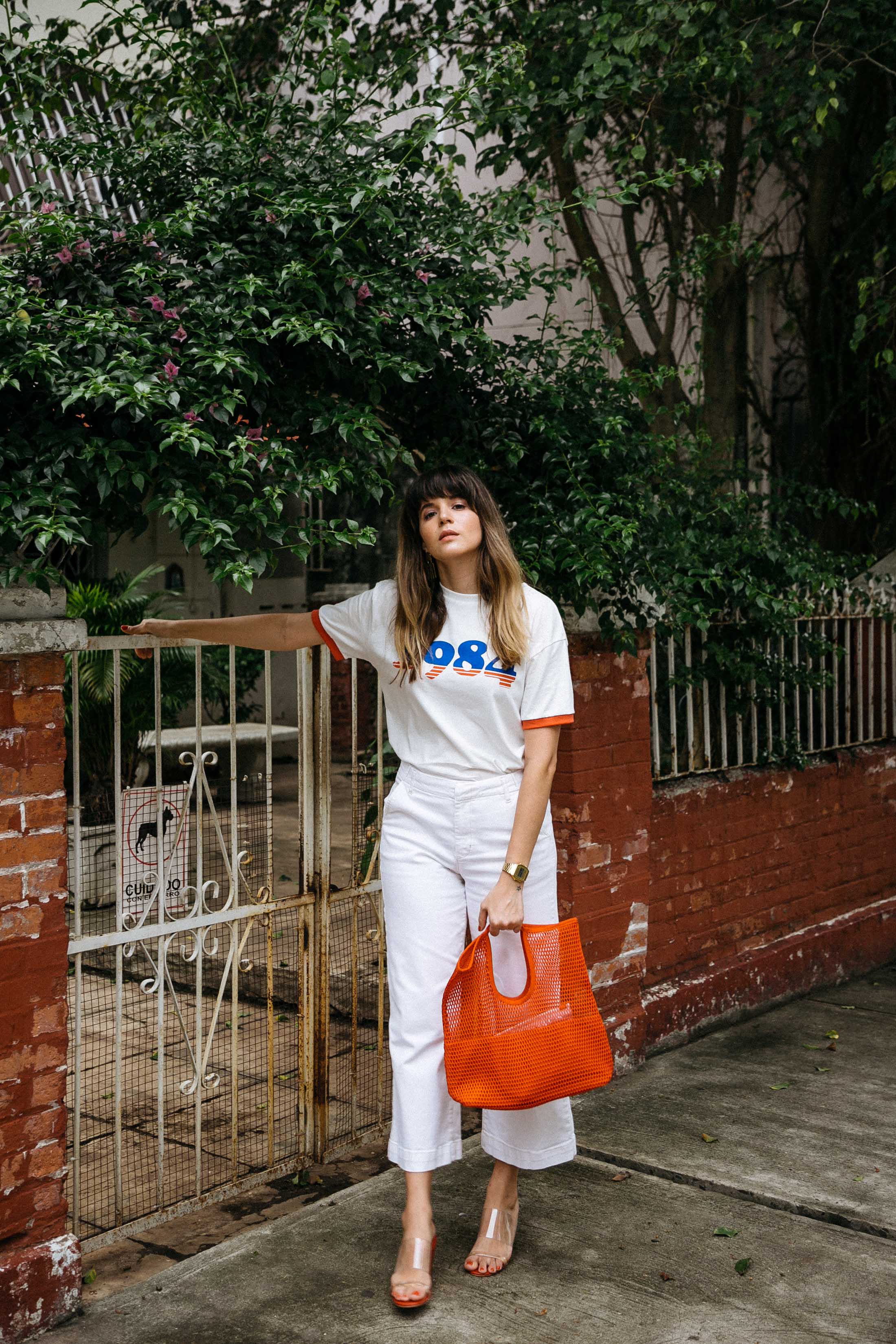 Maristella in a white denim summer outfit