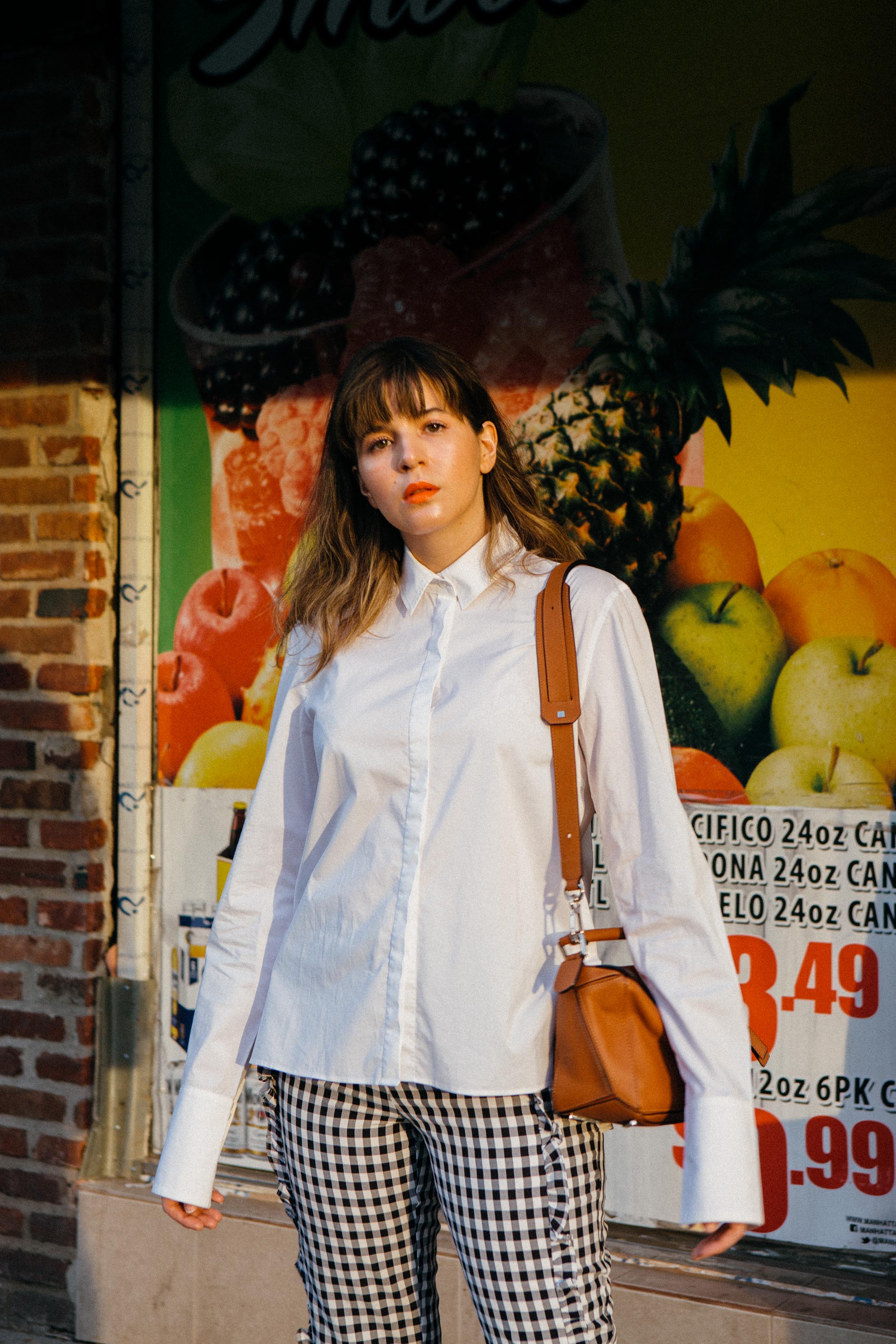 Maristella in a white shirt from H&M Studio