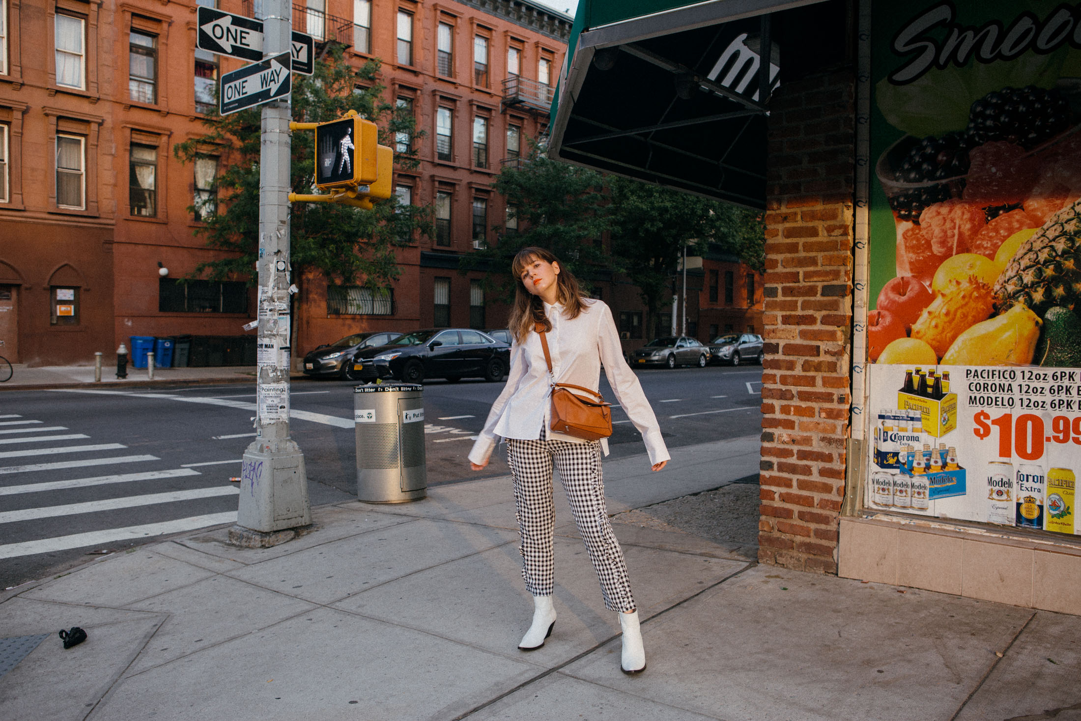 Maristella wears white western boots