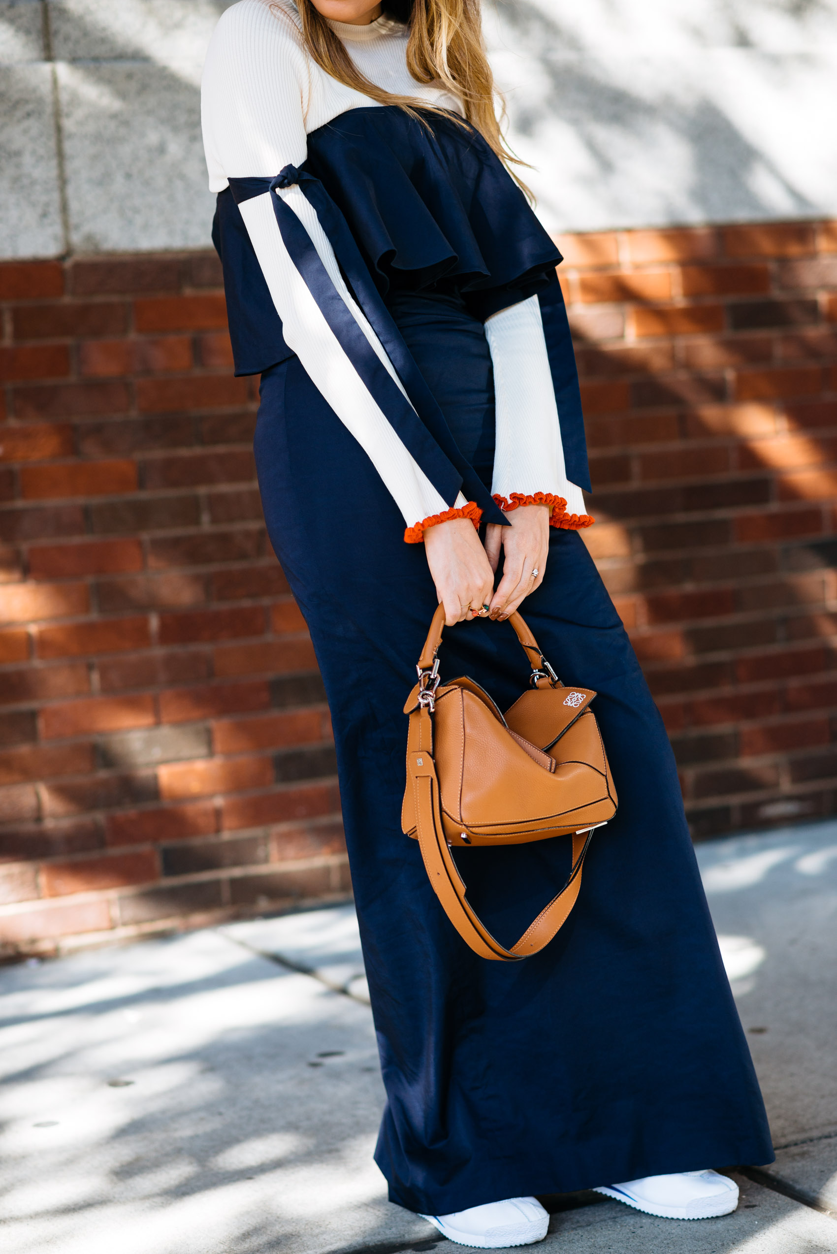 Maristella's fall layering details with Zara, Fame & Partners, Loewe and Nike