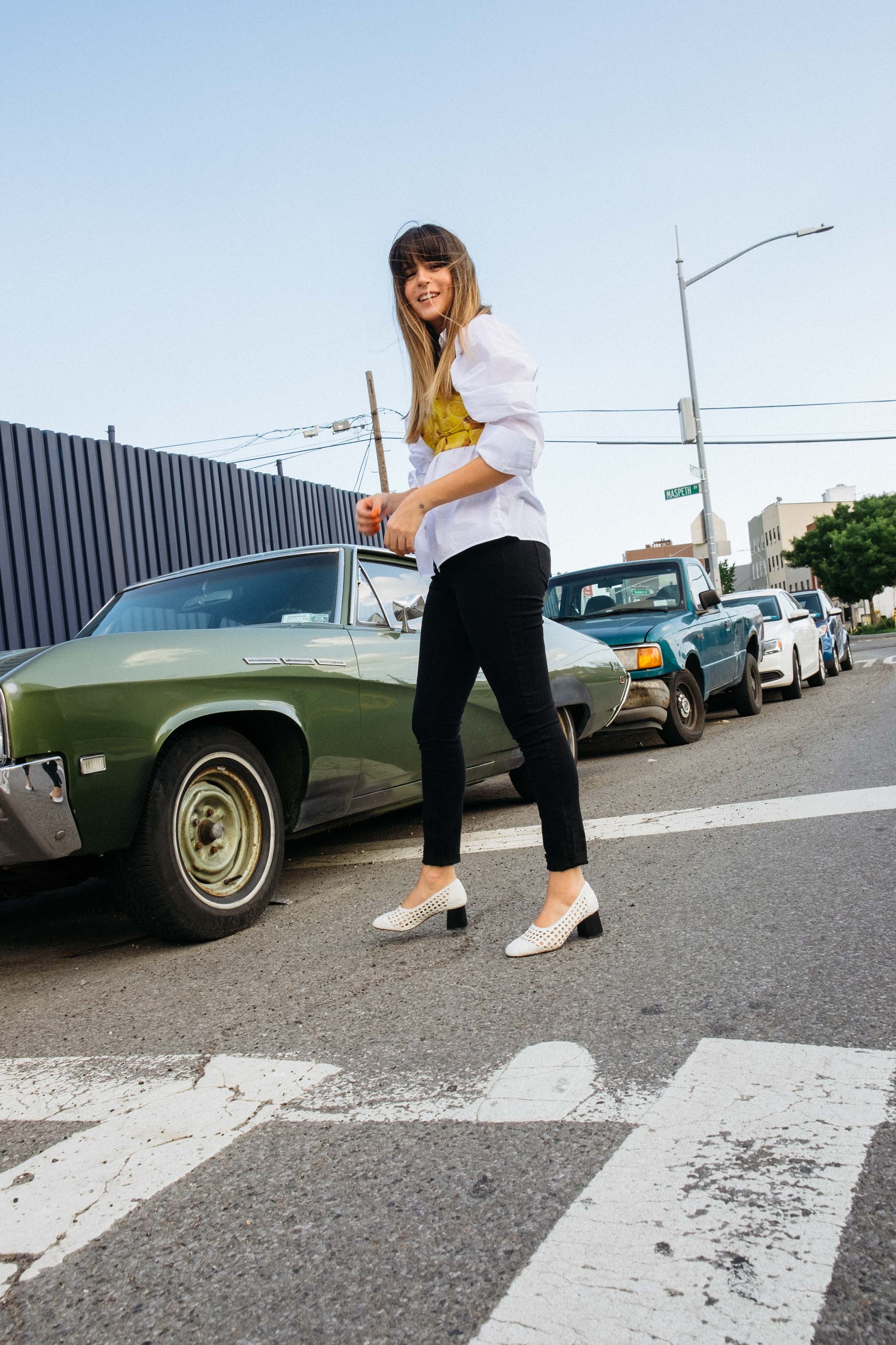 Maristella in Noisy May jeans, Sandro Paris shoes, H&M white shirt and Alice & Olivia bustier