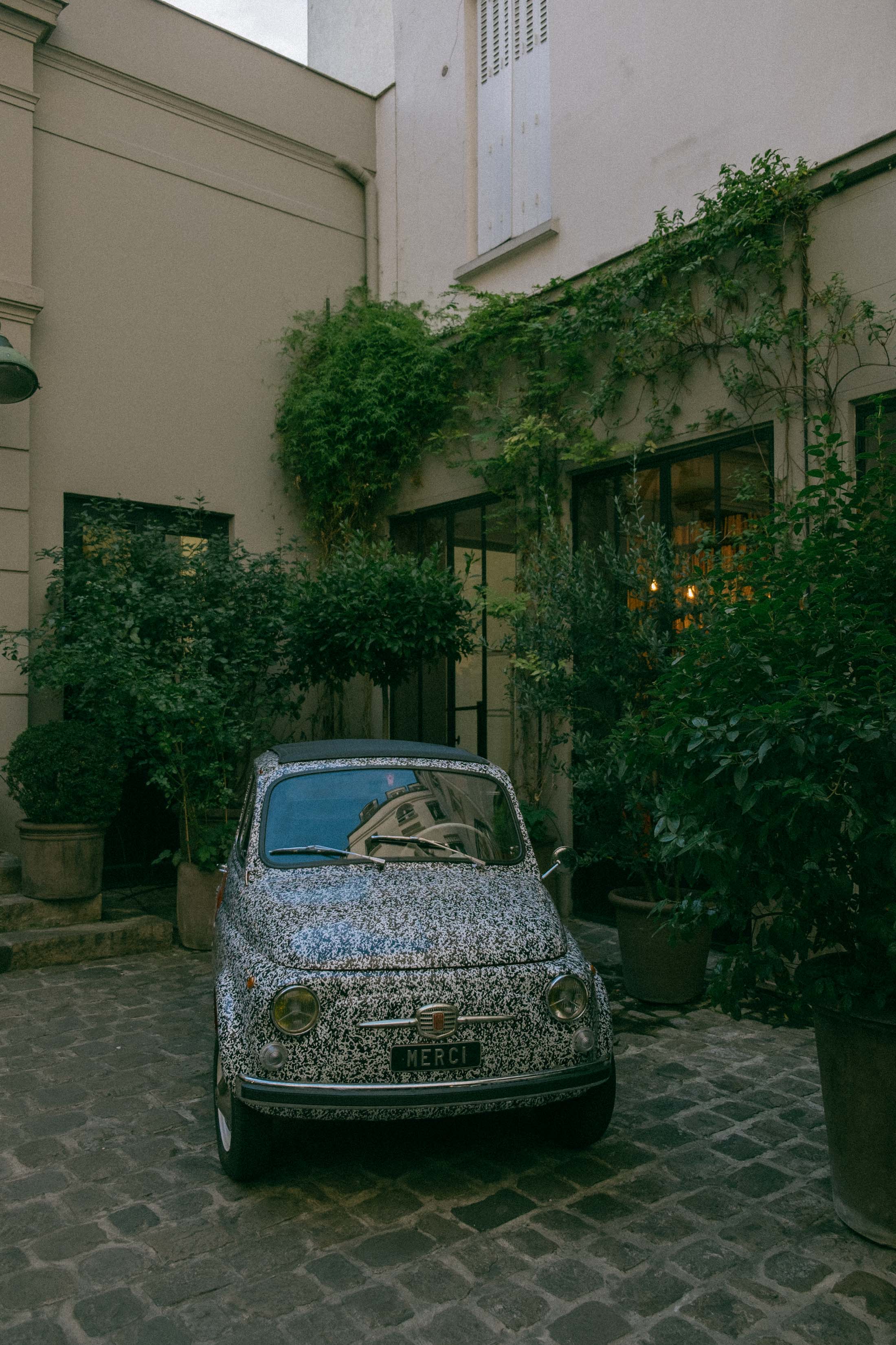 Vintage car outside of the Merci store in Le Marais Paris