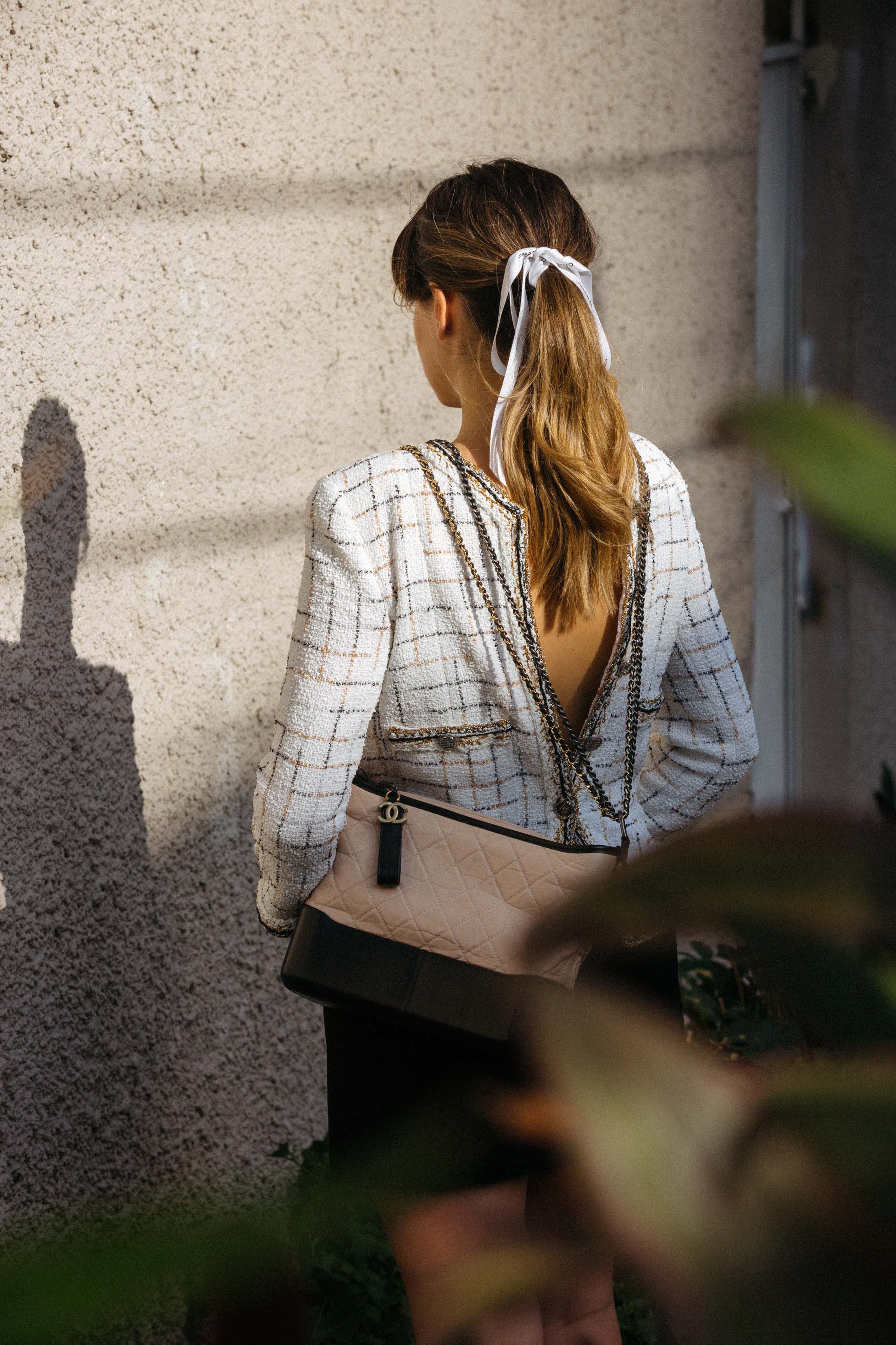 Chanel ribbon ponytail hairstyle